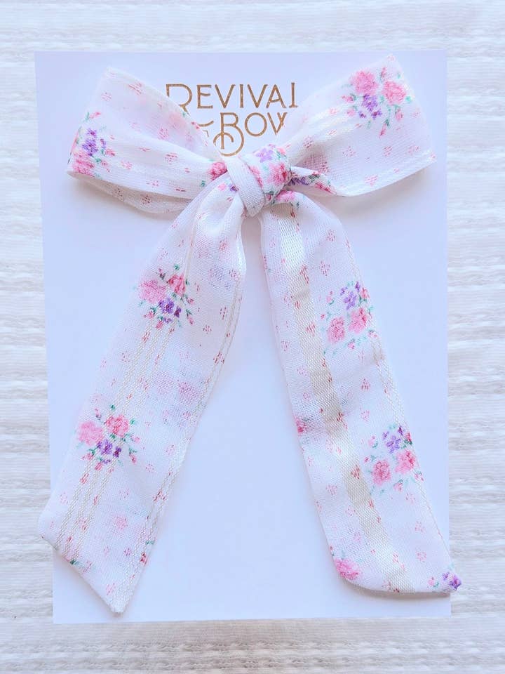 Lång svansad rosett på klämma • Rosetta blommig för wholesale av Revival Bow Co.