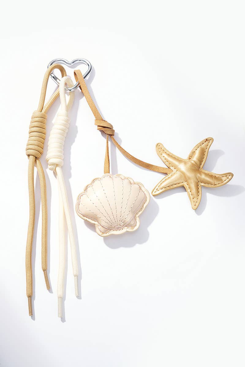 beige Taskevedhæng og nøglering med skaller PC43 for engroshandel på Faire0