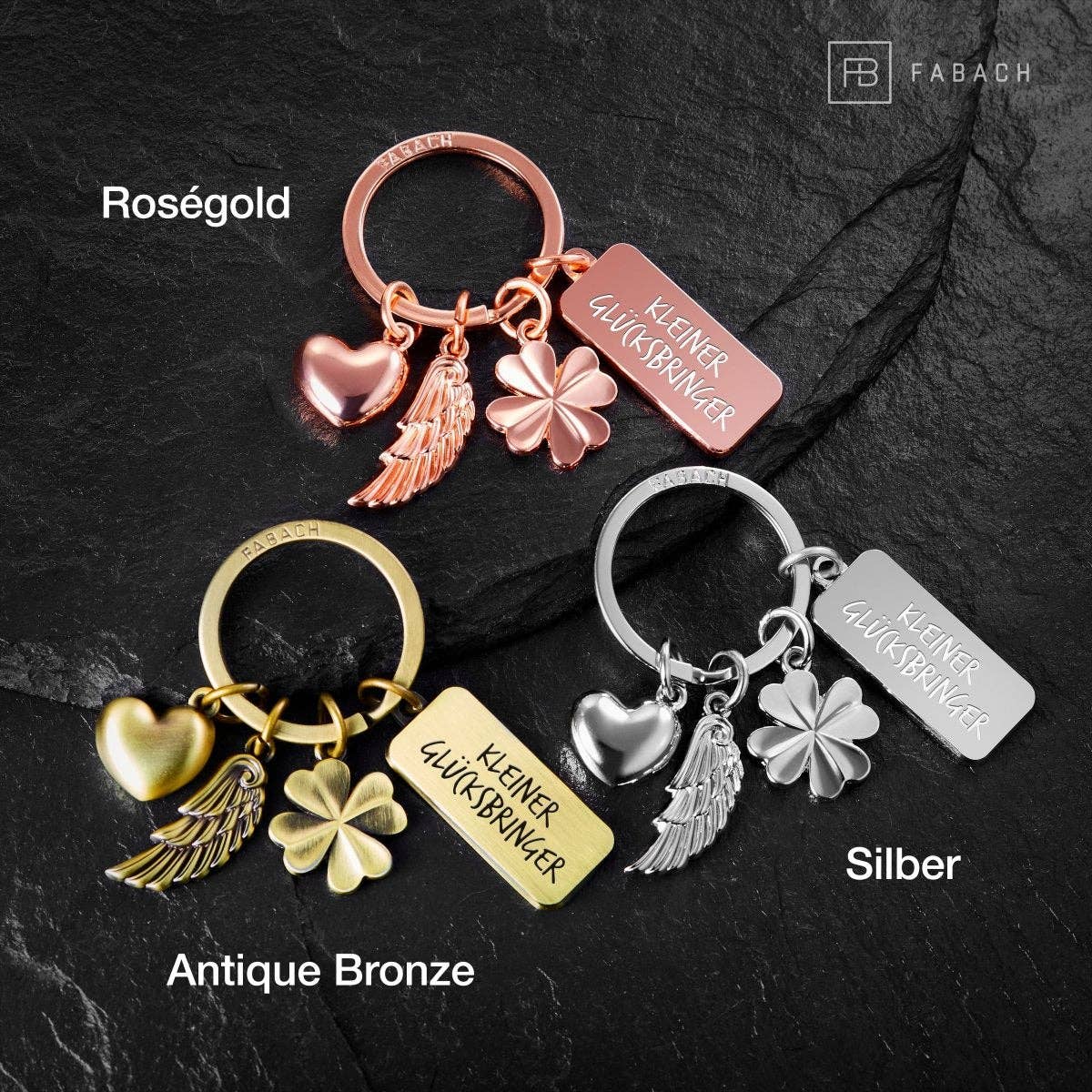 FABACH – Die Schlüsselanhänger-Schmiede – Großhandel Schlüsselanhänger – Unisex – "3 Charms" Schutzengel Schlüsselanhänger - Engel Herz Kleeblatt Glücksbringer mit Botschaft Gravur "Kleiner Glücksbringer"6
