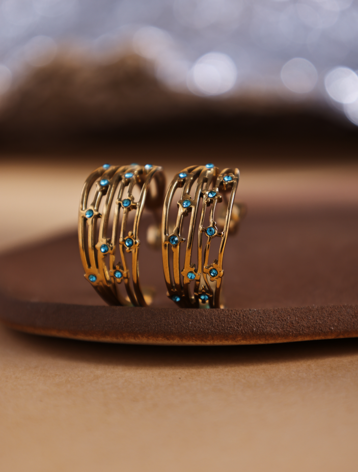 Revelari – wholesale Hoop earrings – Gold Hoop Earrings with Blue Crystal Accents2