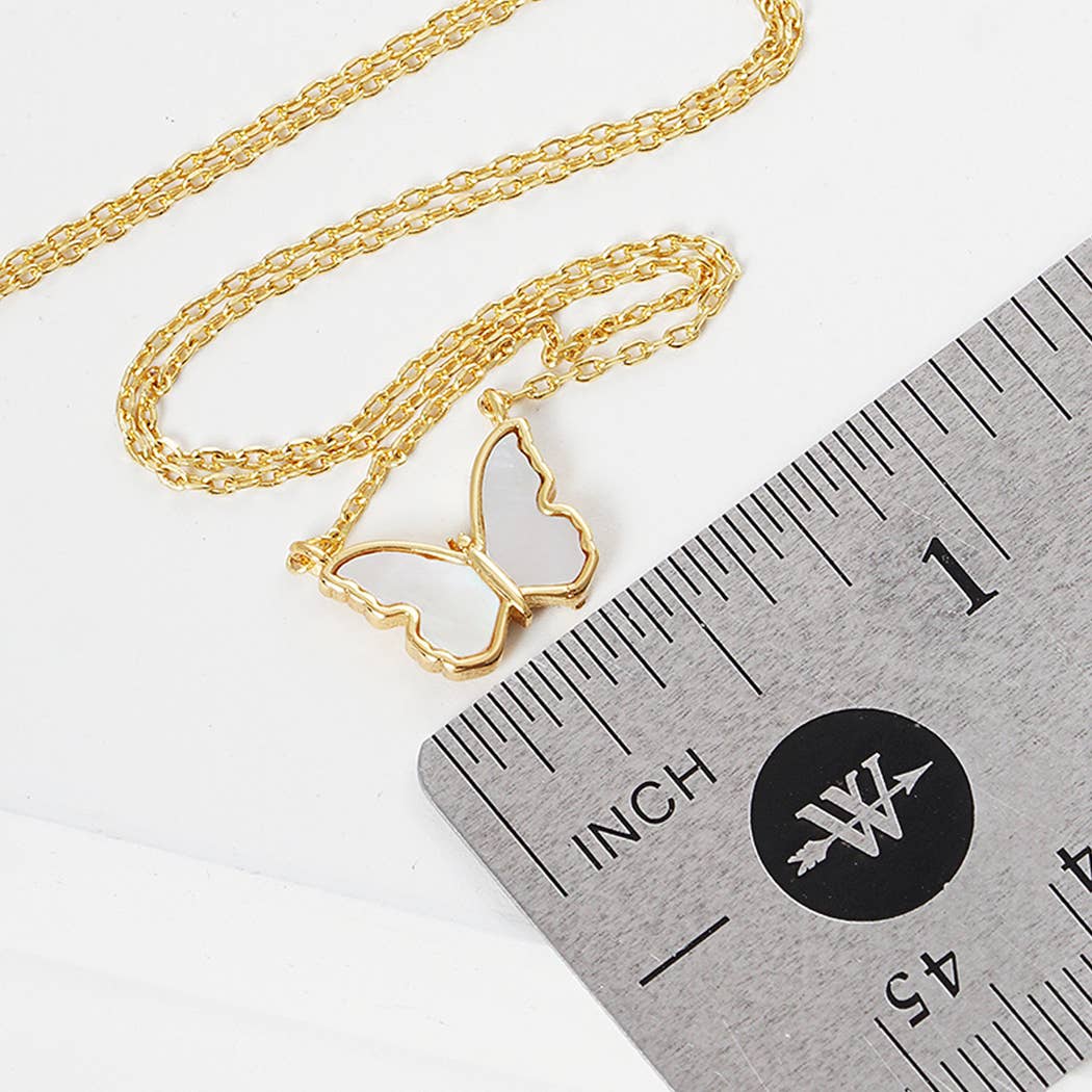 Fashion City - Vente Colliers à pendentif - Pendentif en forme de papillon trempé dans l'or1