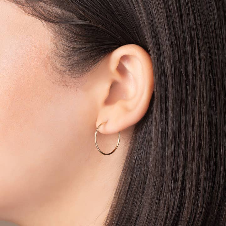 Or Créoles rondes sans fin 14 carats en vente sur Faire13