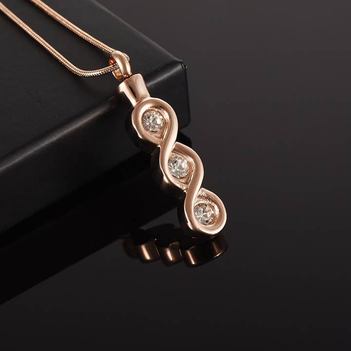 Collana con urna di cremazione con pietre preziose Infinity con strass per la vendita all'ingrosso da parte di Cherished Emblems