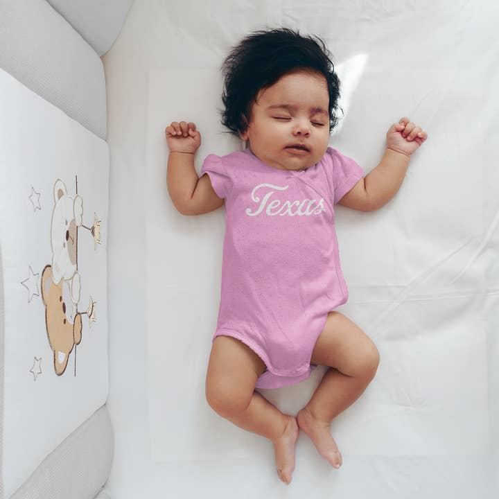 Texas Script Onesie for wholesale by Made in Texas Co.