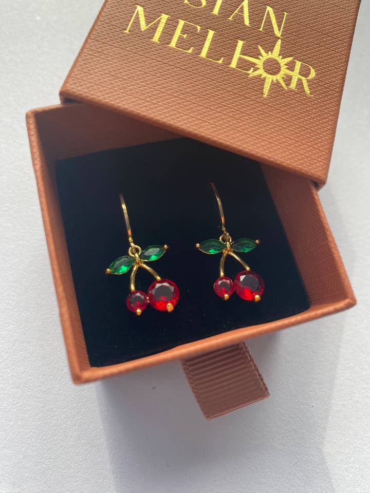 cherry huggie hoops for wholesale by Sian Mellor