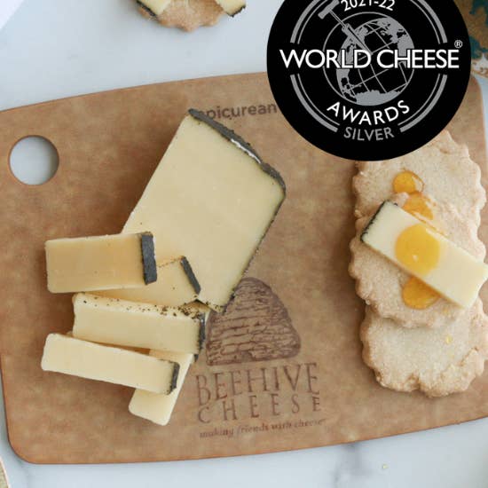 Beehive Cheese Co. LLC - Wholesale Cheese - Wholesale Teahive Earl Grey Rubbed Utah Cheddar - Cheese
