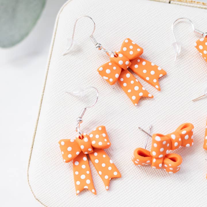 EJ Clay Co - Wholesale Dangle earrings - TN Vols Orange & White Polka Dot Bows1