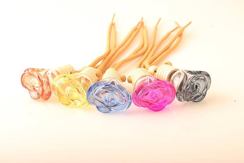 Candles Meta – Ambientador para carro – Unissexo por atacado – Purificador de ar colorido em forma de rosa para carro pendurado em garrafa vazia12