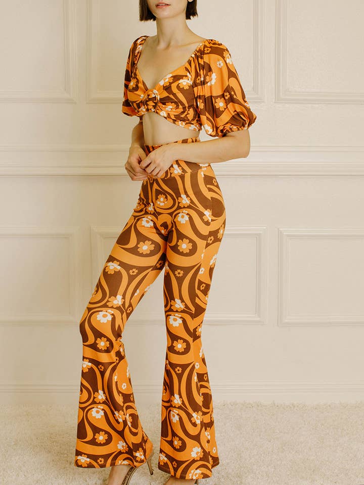 HP1674- 70's Inspired Daisy Print Bell-bottom Pants for wholesale by STORIA