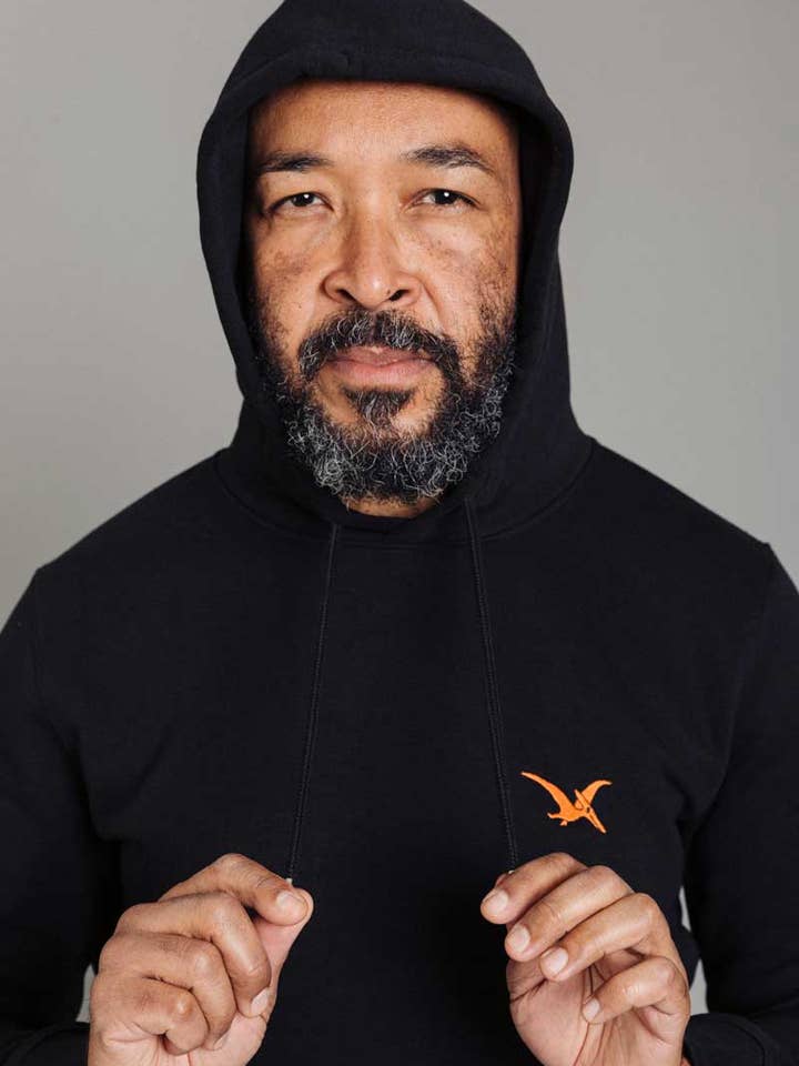 Sudadera dinosaurio unisex FLUGY negra para venta al por mayor de KREUZUEBER