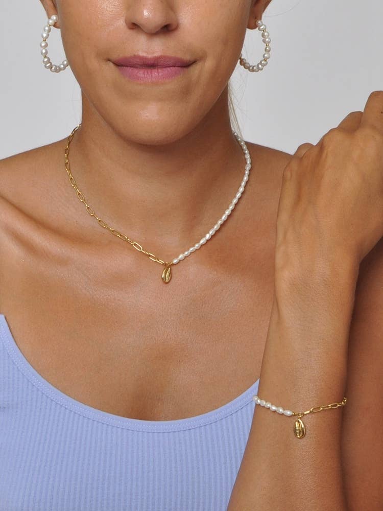 gold Stainless Steel Snail Pendant Necklace with Pearls for wholesale on Faire