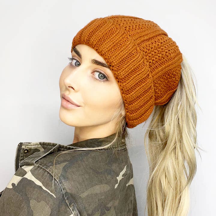 Ribbed Knit Peekaboo Ponytail Fleece Beanie and other Purchase Wholesale ponytail beanie. Free Returns & Net 60 Terms on Faire trending on Faire.