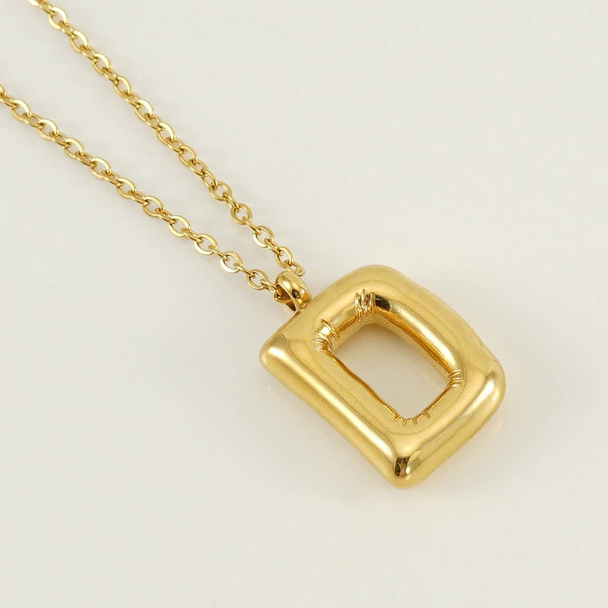NINEXIS - Wholesale Pendant/Charm Necklace - CWAJE1933_Stainless Steel Glossy Bubble Letter Necklace Gold3