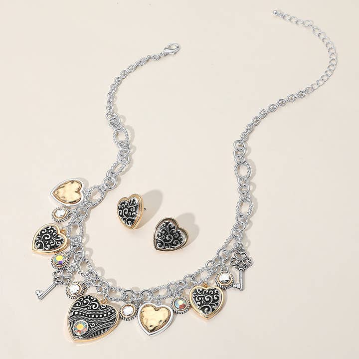 Sensibling Corp. – Großhandel Kette mit Anhänger/Charm – Zweifarbige antike Metall-Herz-Kleeblatt-Schlüssel-Stein-Anhänger-Halskette1