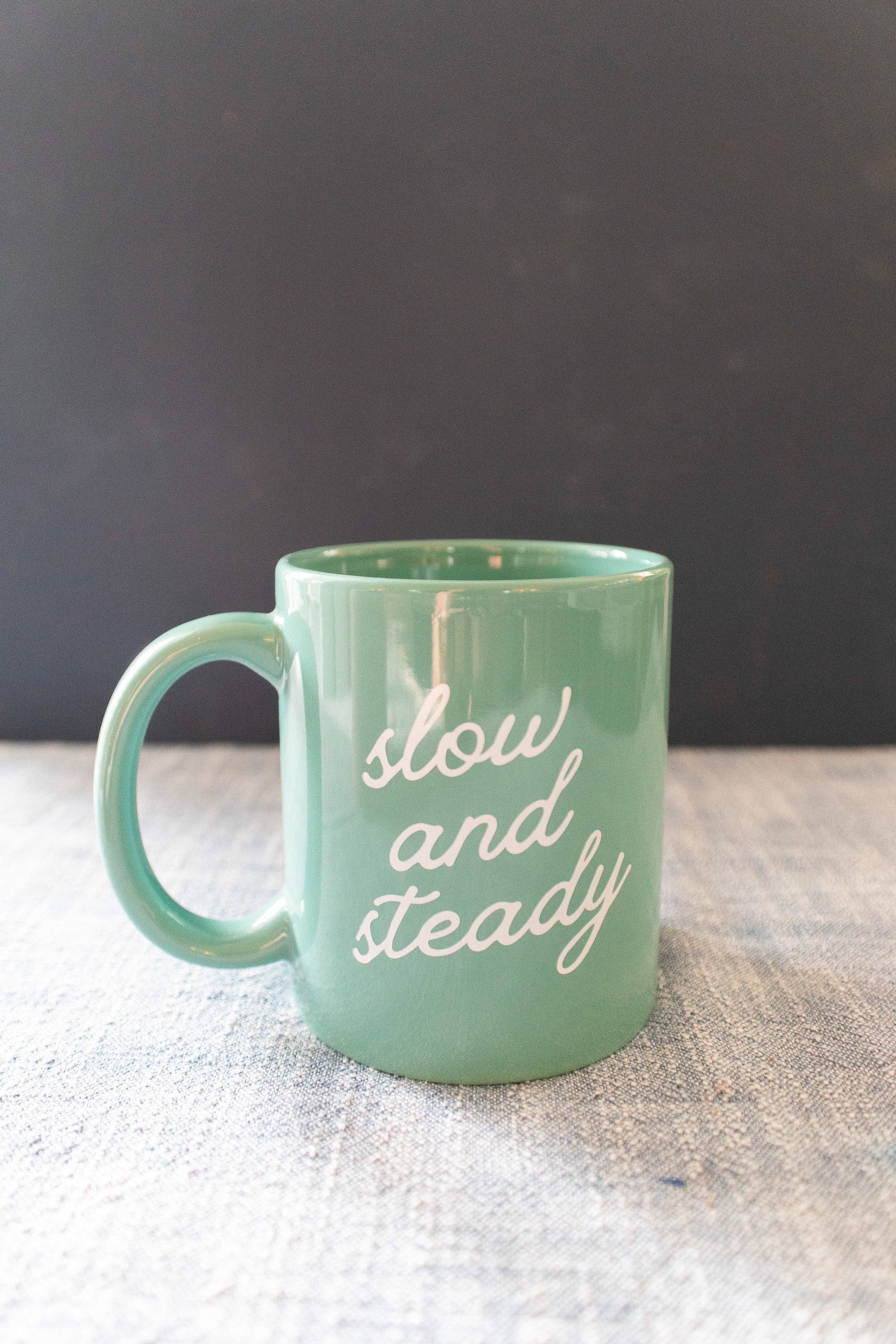 Gather Goods Co - Cards, Coasters, Tea Towels, Art, Mugs - Wholesale Coffee Mug - Green Ceramic Coffee Mug with Slow and Steady Phrase, 11oz1