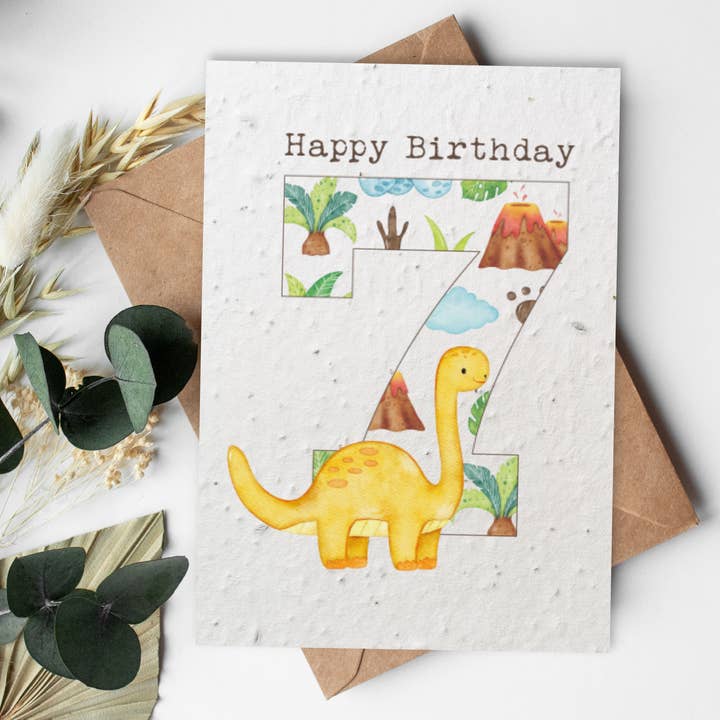 Biglietto di auguri in carta semi A6 — Dinosauro — Buon compleanno 7 per la vendita all'ingrosso da parte di Little Green Paper Shop