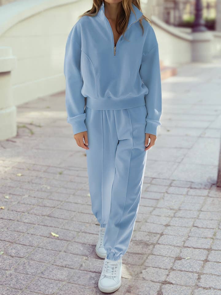 Ensemble actif avec haut à demi-fermeture éclair et joggeurs pour la vente par 1 the Woman