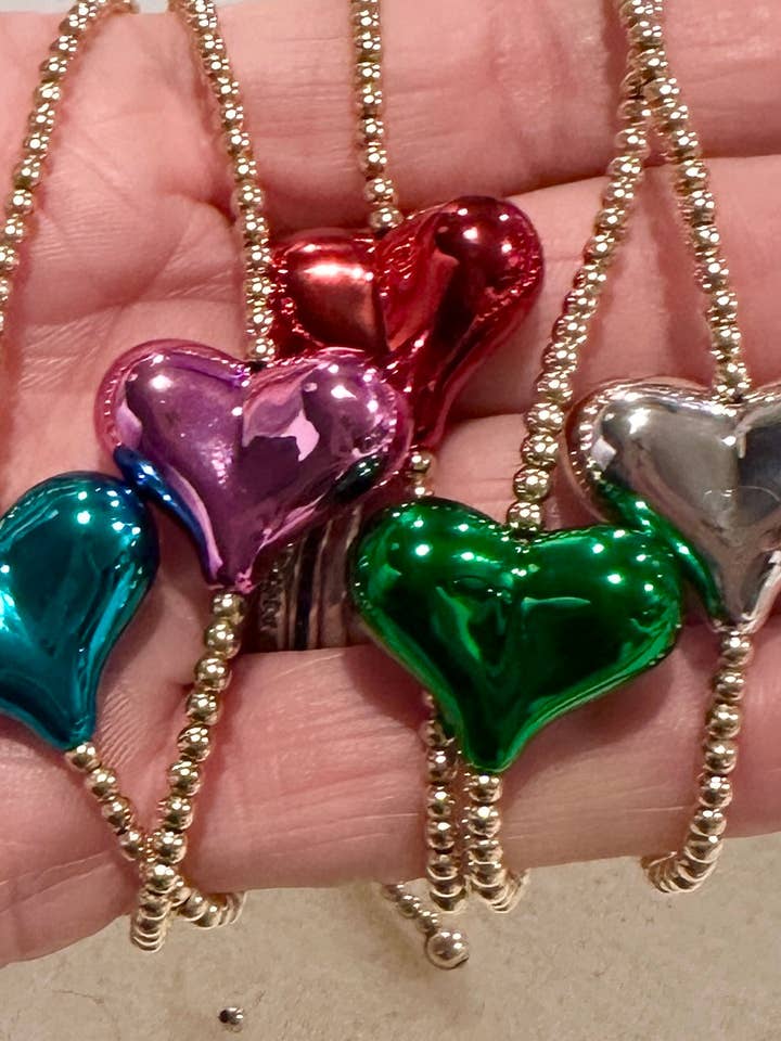 Metallic Puffy Heart Bracelets ~Limited Release while supplies last! and other Purchase Wholesale jbd. Free Returns & Net 60 Terms on Faire trending on Faire.
