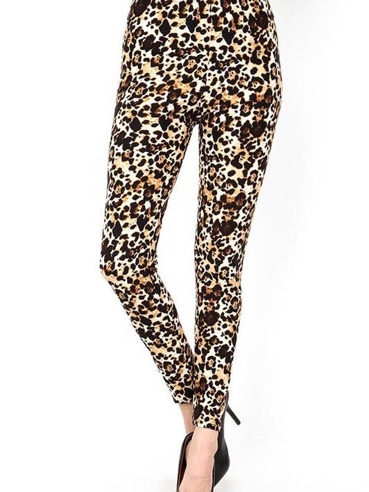 PLUS F643 PLUS SIZE LEOPARDMÖNSTRADE LEGGINGS för wholesale av MIO WHOLESALE