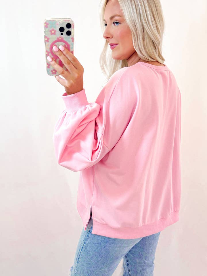 Light Pink Embroidered Bow Lantern Sleeve Oversized Pullover Sweatshirt for wholesale on Faire1