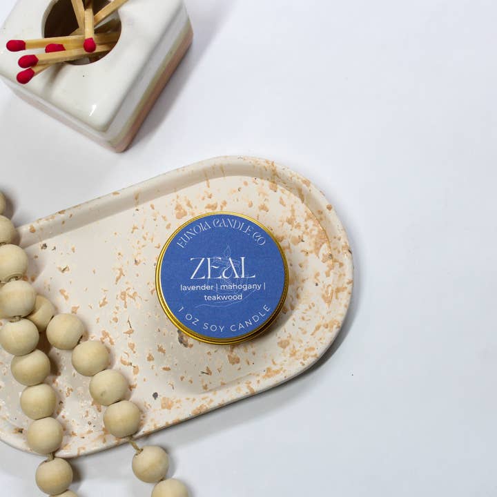 Zeal Soy Candle | 1 oz Gold Tin Candle for wholesale by Eunoia Candle Co.