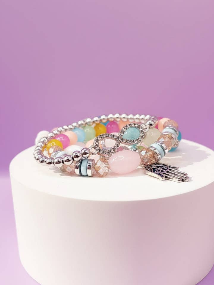 Bow & Hamsa Silver Charm Ceramic Beaded Bracelet Set for wholesale by Arya Jewellery Wholesale