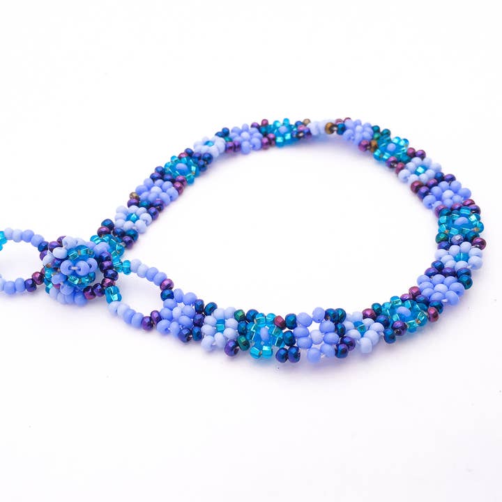 Floral Bloom Bracelet: Periwinkle/ Aqua for wholesale by Beyond Beads