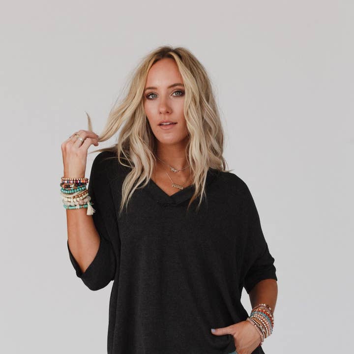 On The Go V Neck Ribbed Essential Tee - Charcoal and other Purchase Wholesale ladies v neck t shirts. Free Returns & Net 60 Terms on Faire trending on Faire.