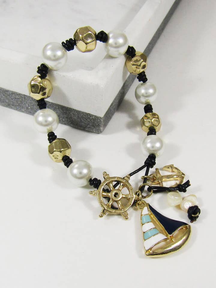 Braccialetto intrecciato con perline marine smaltate a forma di barca nautica per la vendita all'ingrosso da parte di TheTizana