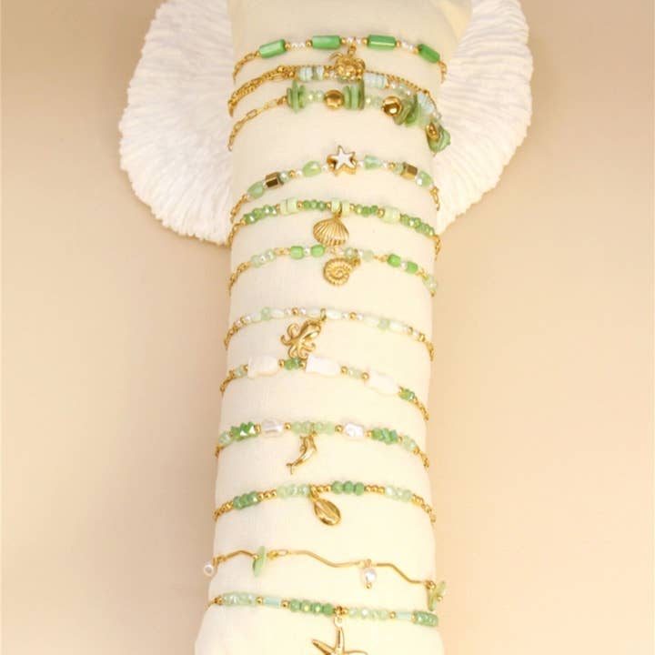 BELLISSIMA BIJOUX - Wholesale Jewelry Set - Set of 12 Stainless Steel Bracelets with Gold Beads0