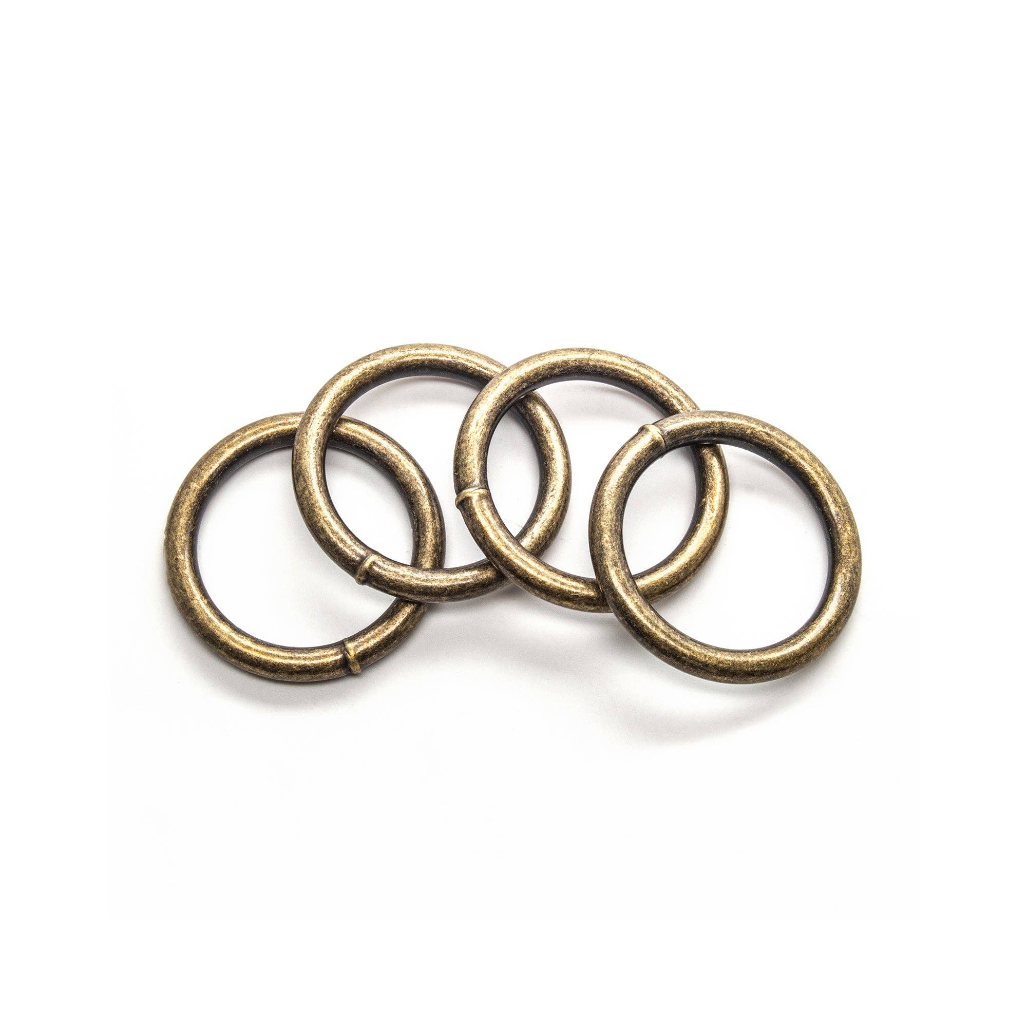 Antique Brass 2" Rings, 4pk for wholesale on Faire1