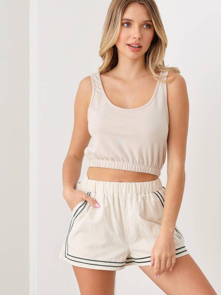 Aktivt elastiskt midjeband Ärmlös beskuren linne för wholesale av Tasha Apparel Wholesale