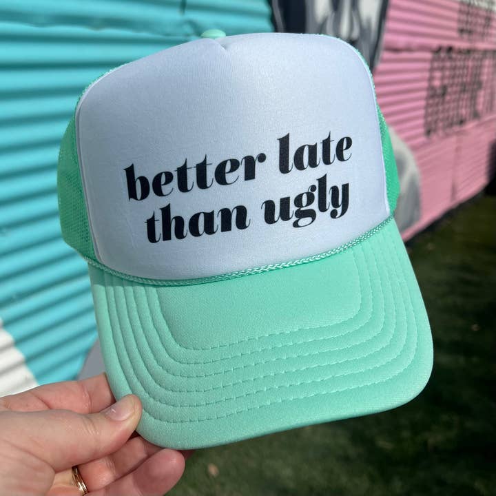 Better Late Than Ugly Trucker Cap (Multiple Color Options) for wholesale by Turquoise & Tequila
