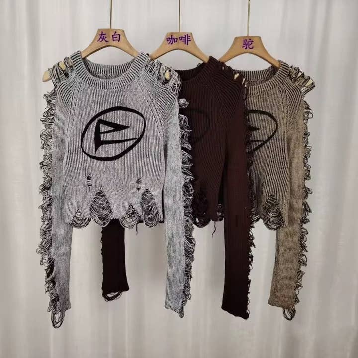 Mode Skadad Tröja för Kvinnor – Trendig & Kantig Stickad Plagg för wholesale av Devine Diva Fashion