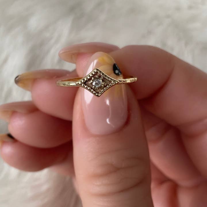 Bague Star Spark en laiton pour la vente par Baizaar