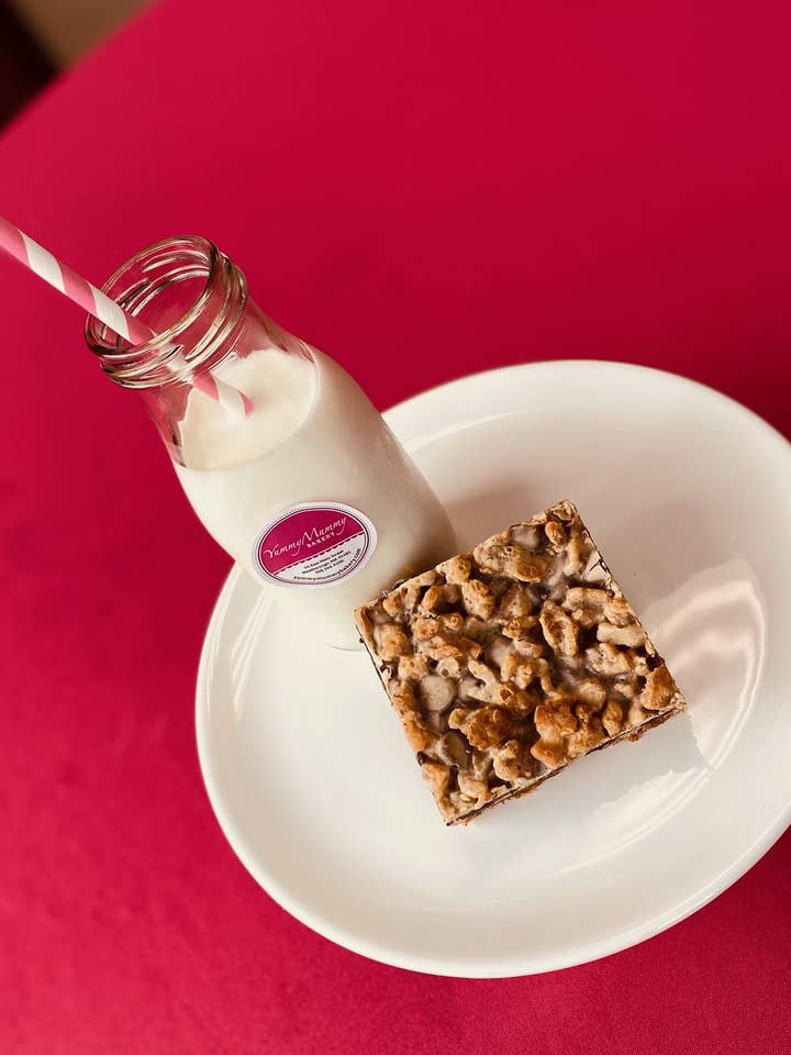 Wrapped 7-Layer Magic Bars with Chocolate Coconut & Walnuts for wholesale by Yummy Mummy Bakery