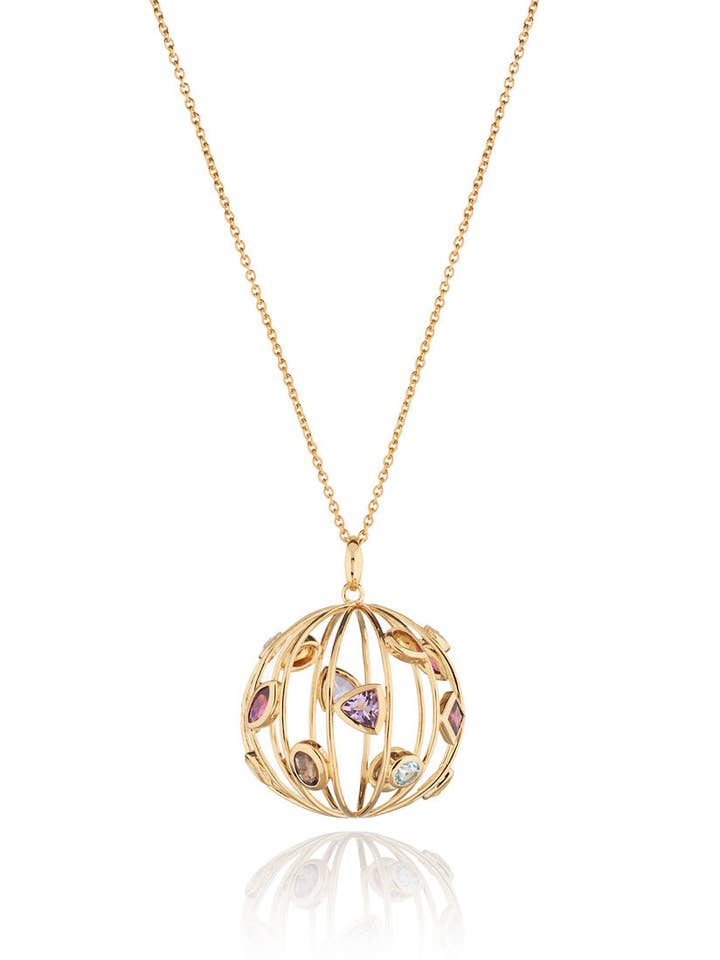 Ciondolo Votra in oro con topazio blu ametista rodolite per la vendita all'ingrosso da parte di Manja