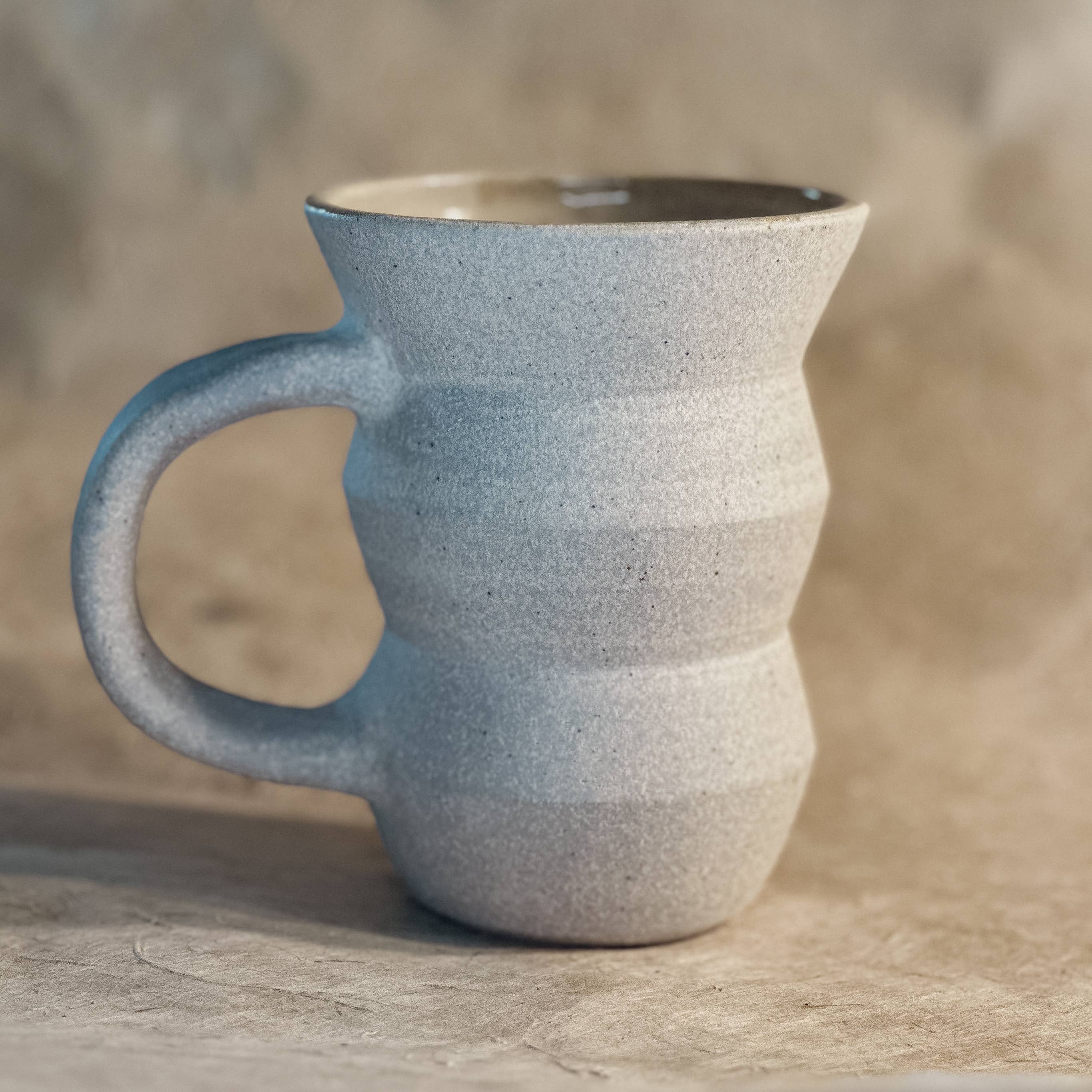 Olivia Snow Ceramics – wholesale Coffee mug – Angled Mug0