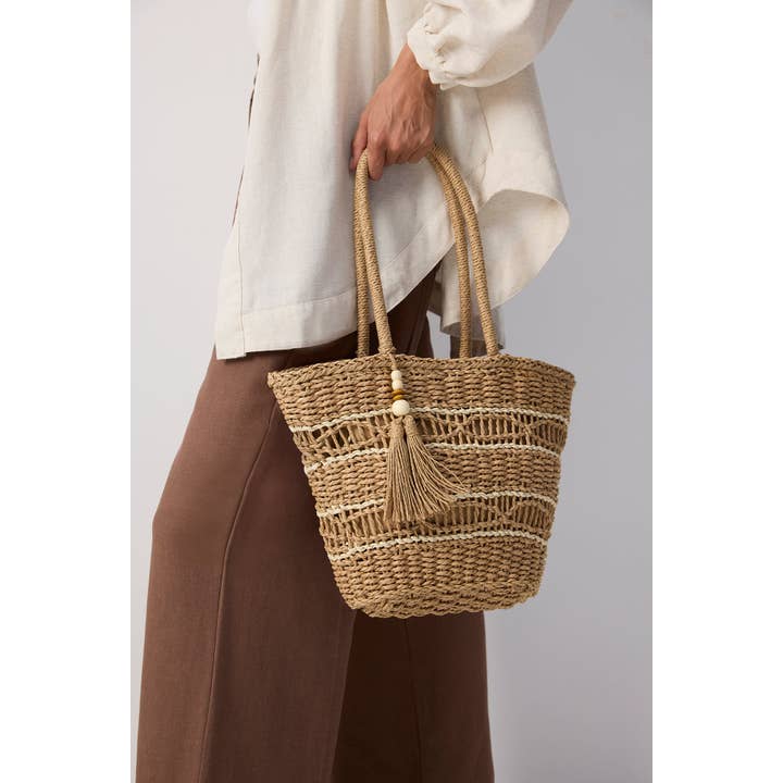 Camel NATURAL STRAW TASSEL TOTE - BOHO SUMMER BEACH BAG for wholesale on Faire