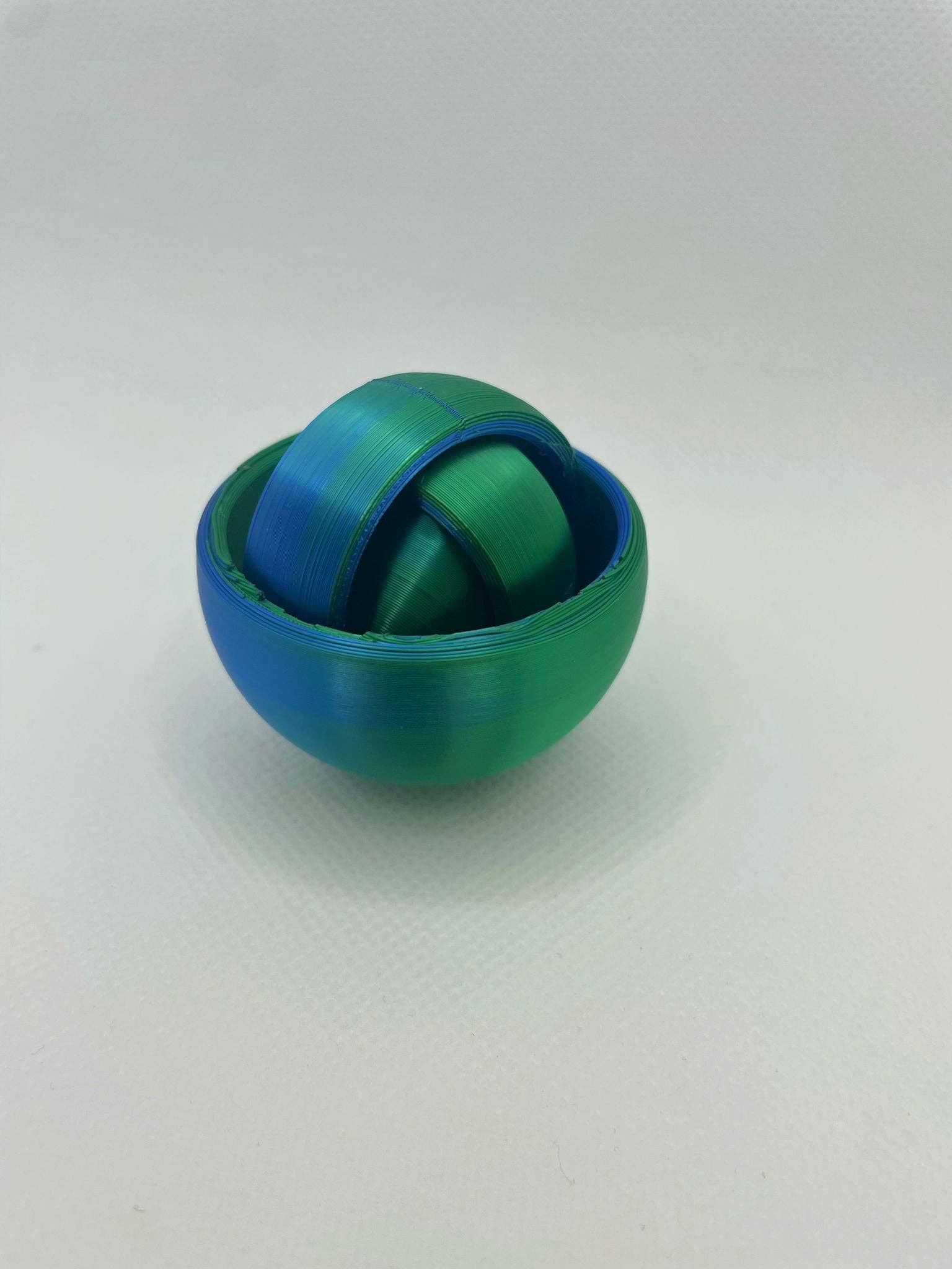 Kahn Creations - Sensory Friendly and Custom Products - Wholesale Fidget Toy - Kids - Gyroscope Fidget Spinner - Blue Green