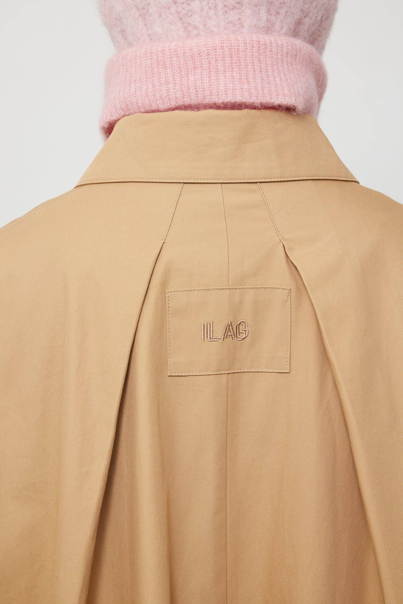 Sand Flekkpetrell mac coat for wholesale on Faire12