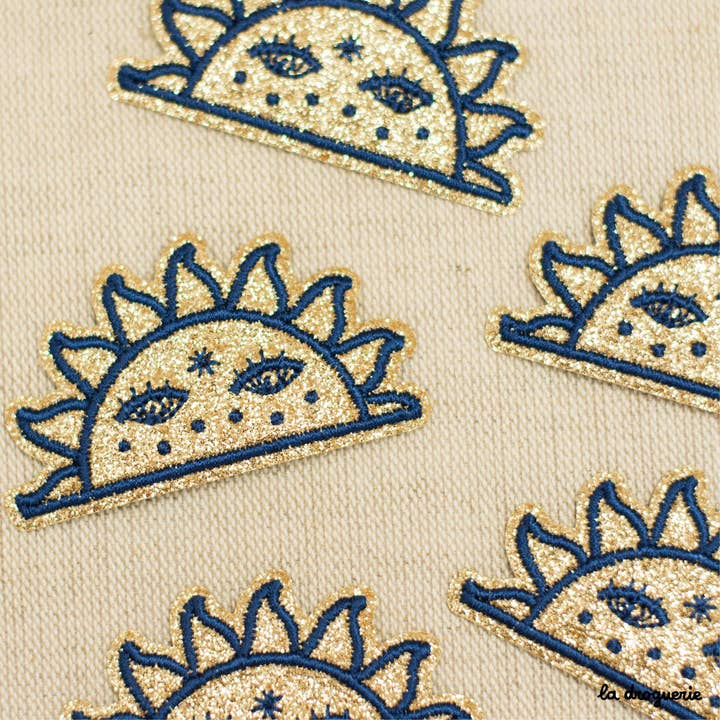 LA DROGUERIE - Vendita all'ingrosso Toppe - Toppa a mezzo sole glitterata da 63 mm