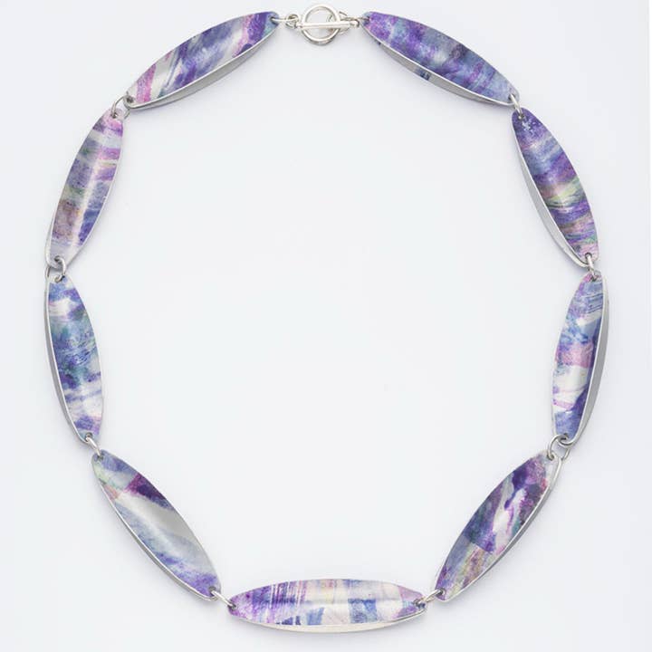 Aluminium clam style necklace muted mauves . for wholesale by Rachel Stowe Jewellery