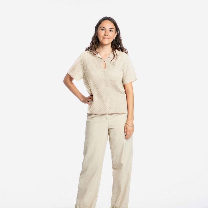 Blusa a punto traforato osso per la vendita all'ingrosso da parte di Matona