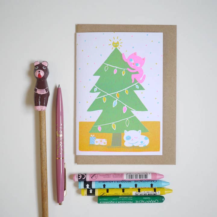 Happy Holiday kitty Xmas tree - A6 risograph card for wholesale by Bel's Art World