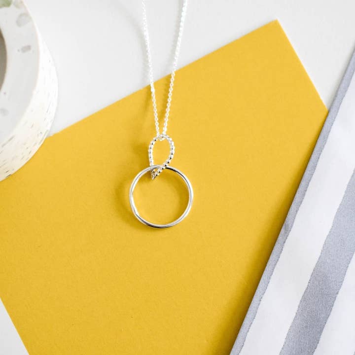 Tiny dotty circle/teardrop necklace for wholesale by Claire Lowe Jewellery