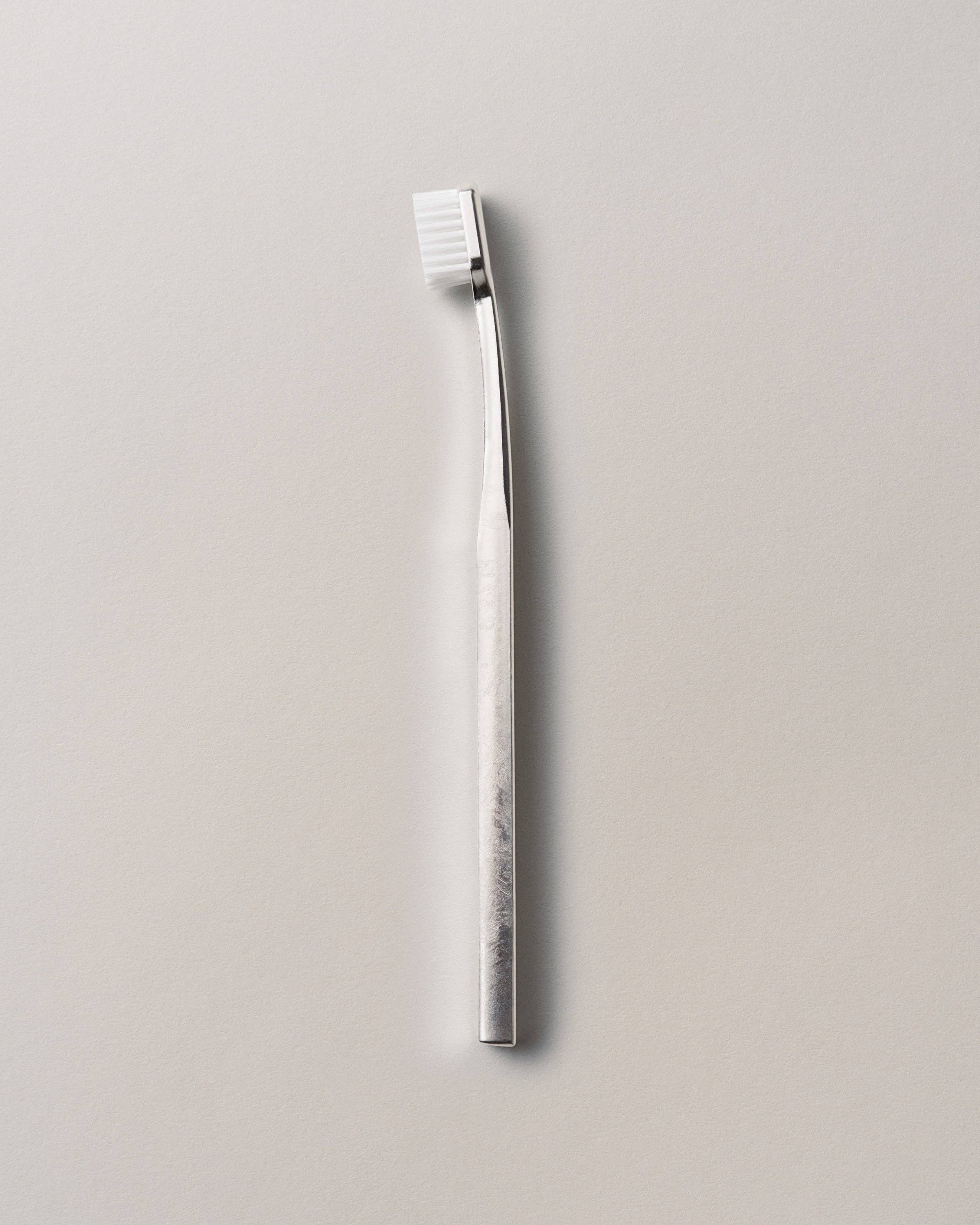 Silver White Silver Plated TOOTHBRUSH SILVER/WHITE for wholesale on Faire2