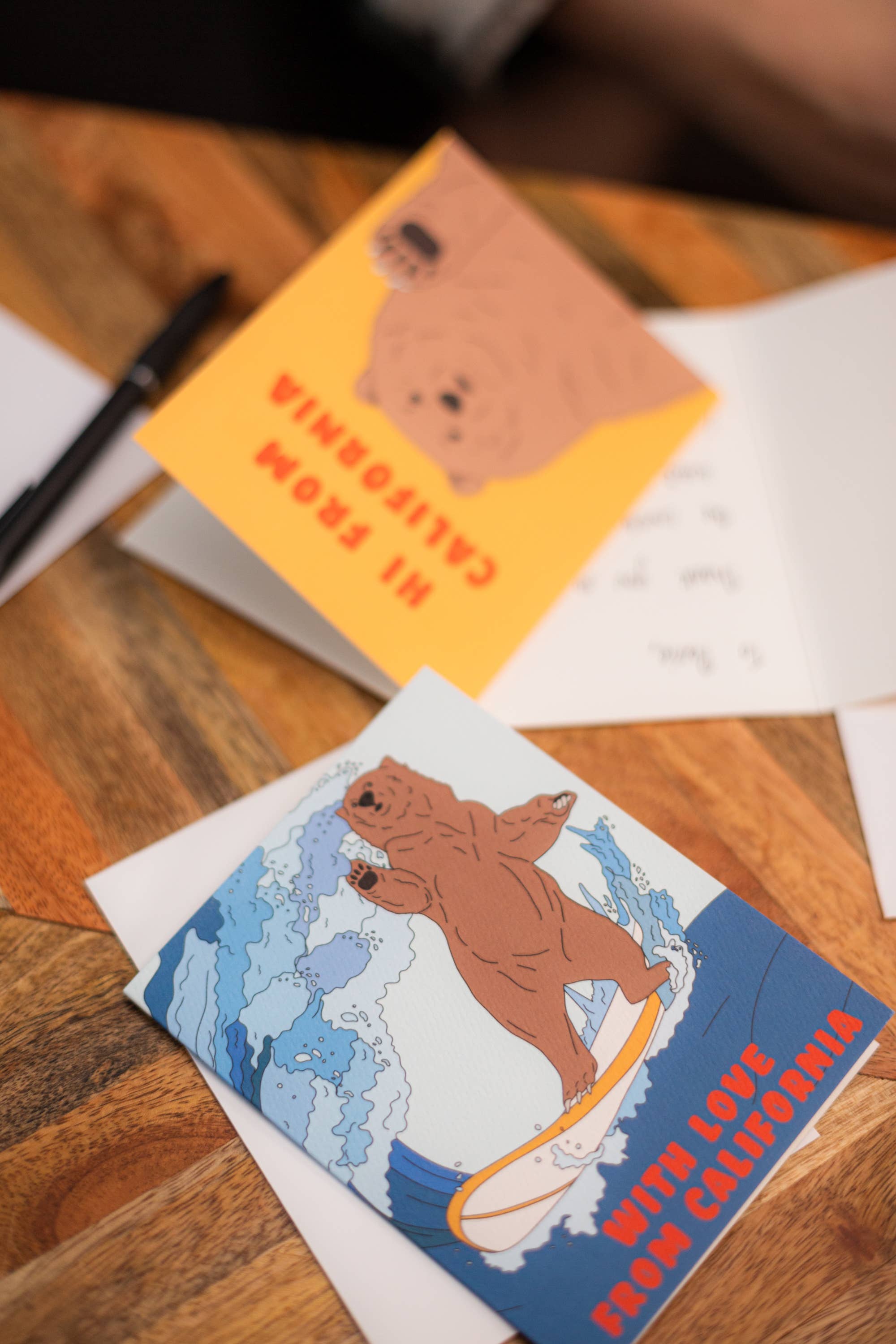 Illustrating Amy - Wholesale Travel Card - California Surfing Bear Card4