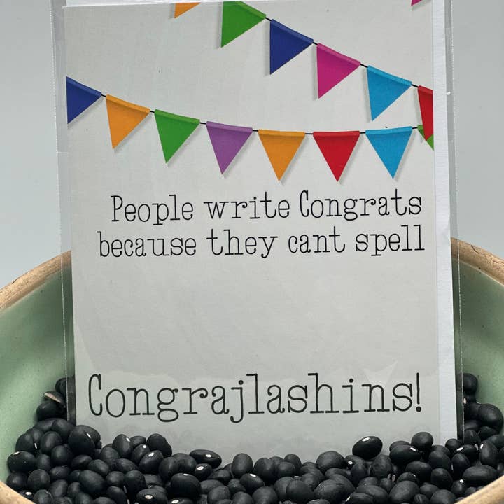 Buchstabiere Glückwunsch! Grußkarte für den Großhandel von Crooked Halo