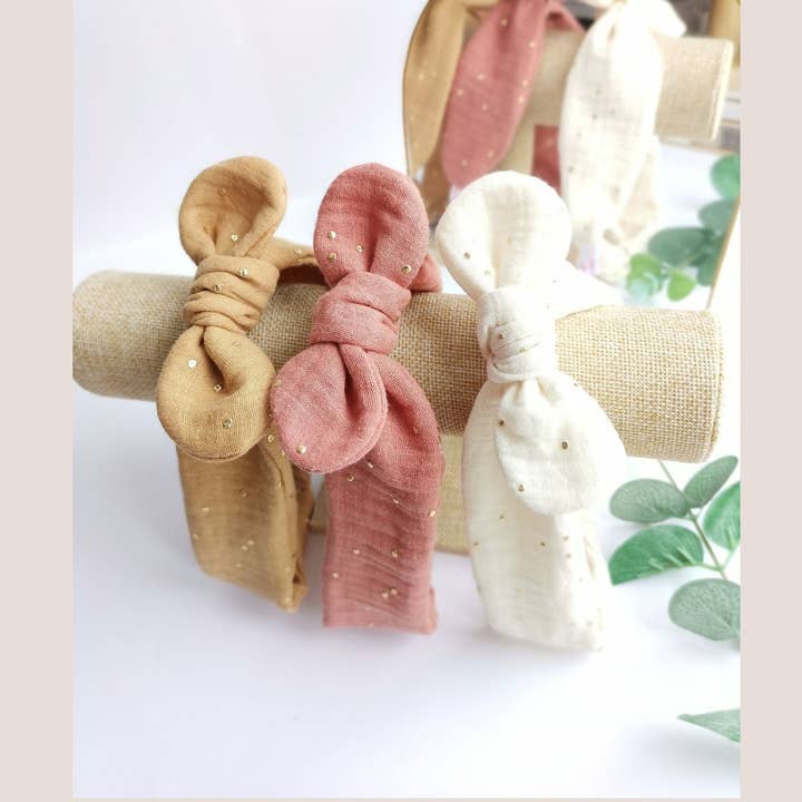 GULD PRICKIGA DUBBLA GASBINDA PANNBAND för wholesale av Tête de Lylotte